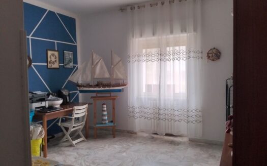 Appartamento con mansarda, terrazzo e due garage